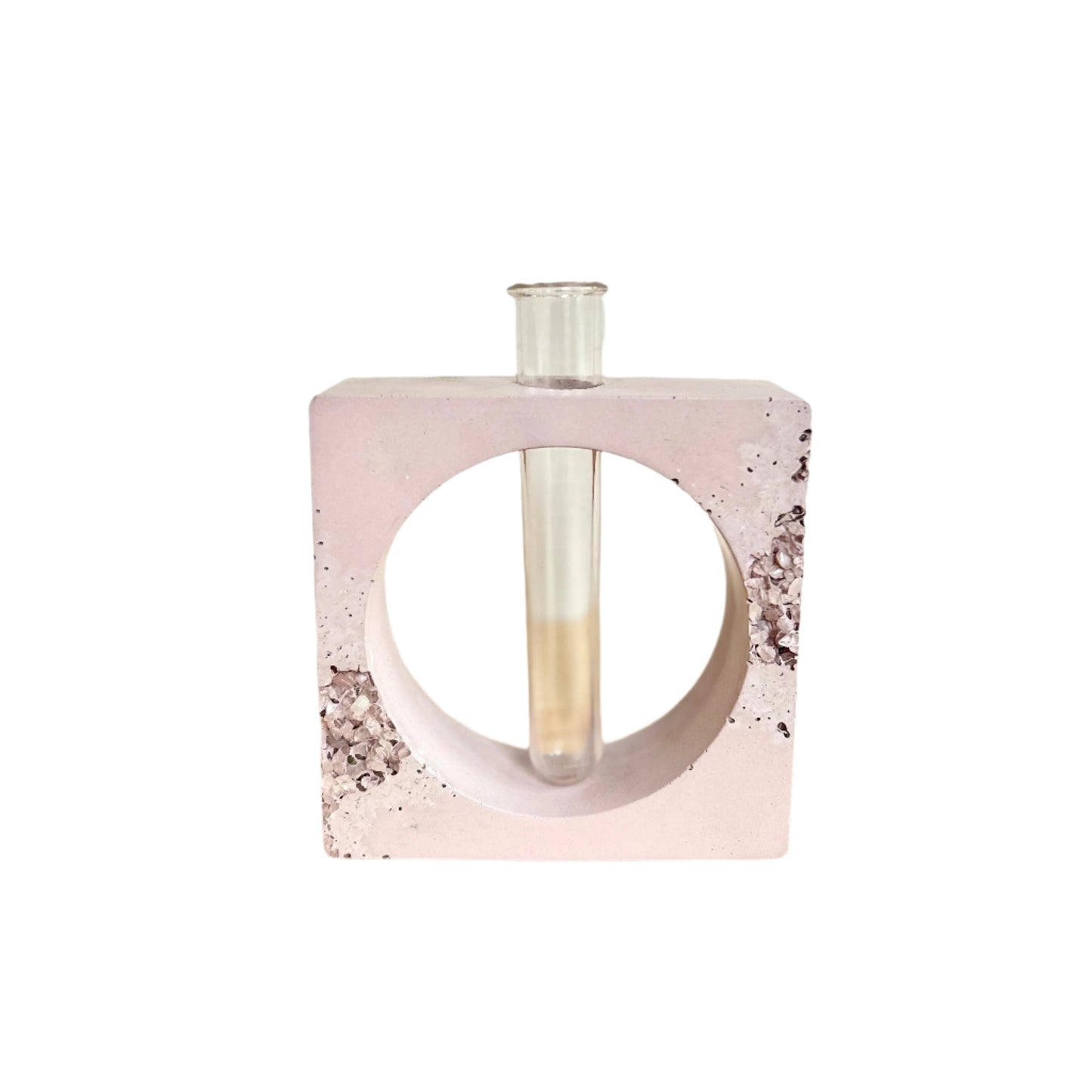 Square cement propagation station in pink with rose quartz crystals.