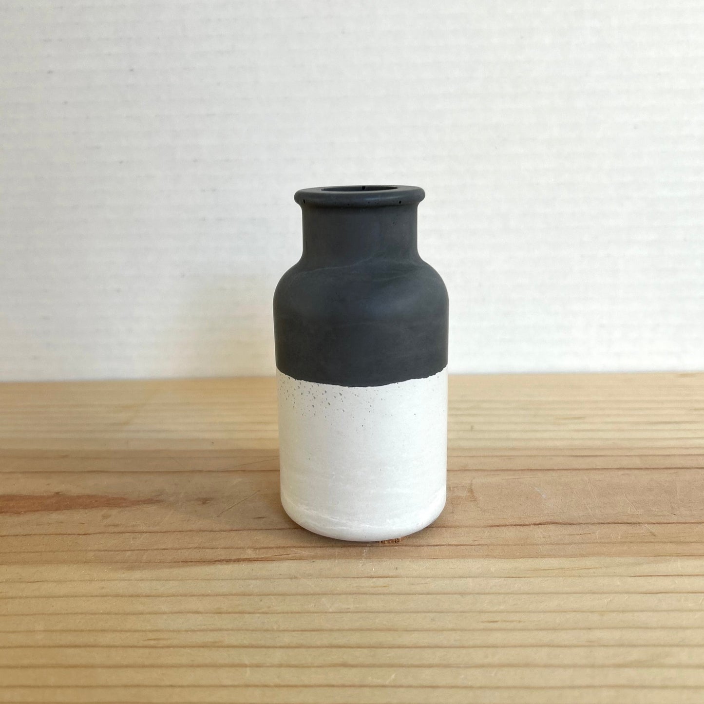 Small Concrete Smooth Vase in layered black and cream. Love Nene Cement Vases.
