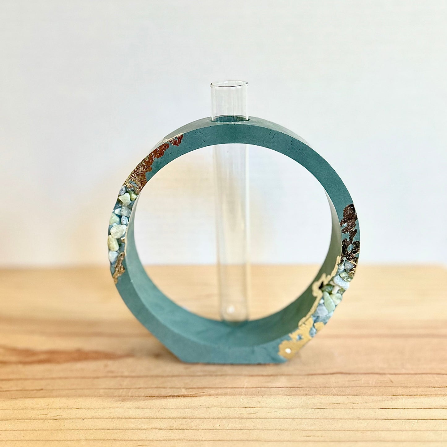 Round Propagation Station in green with stone & gold details.