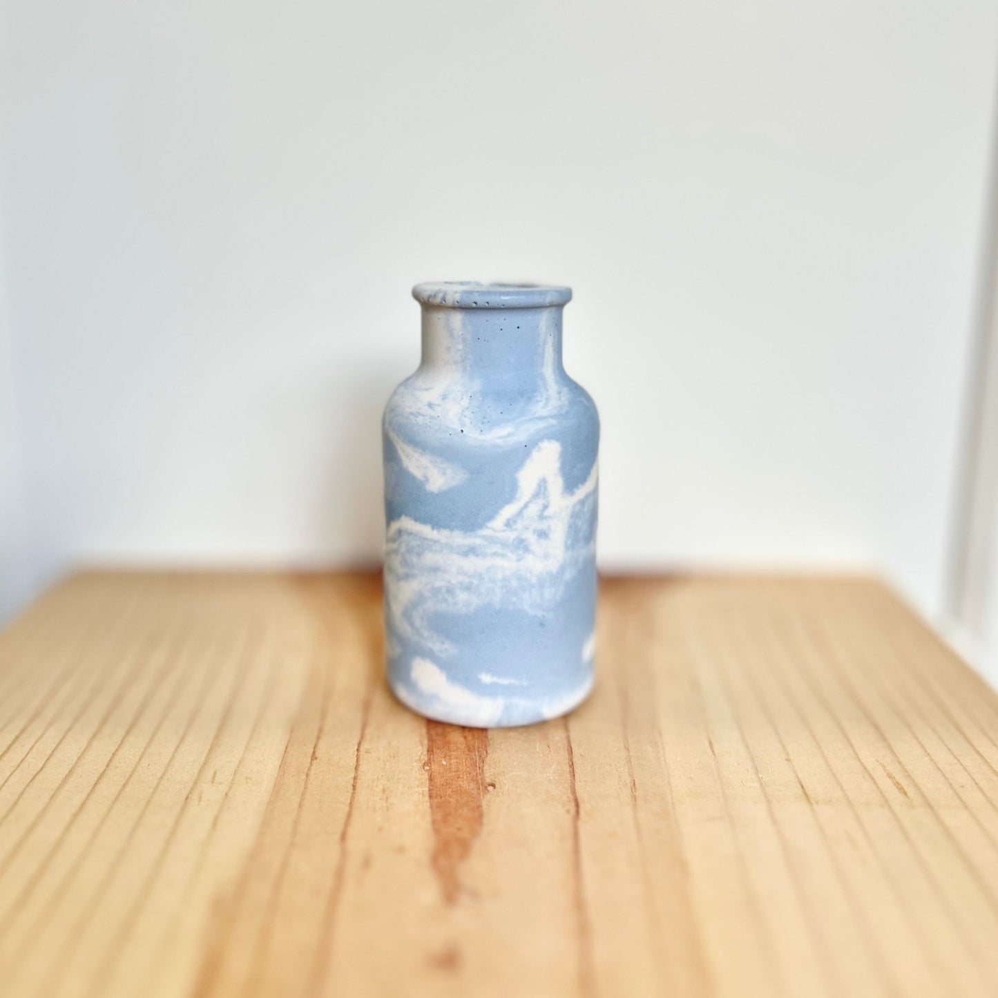 Concrete smooth vase in marbled ice blue. Love Nene concrete home accessories and decor.