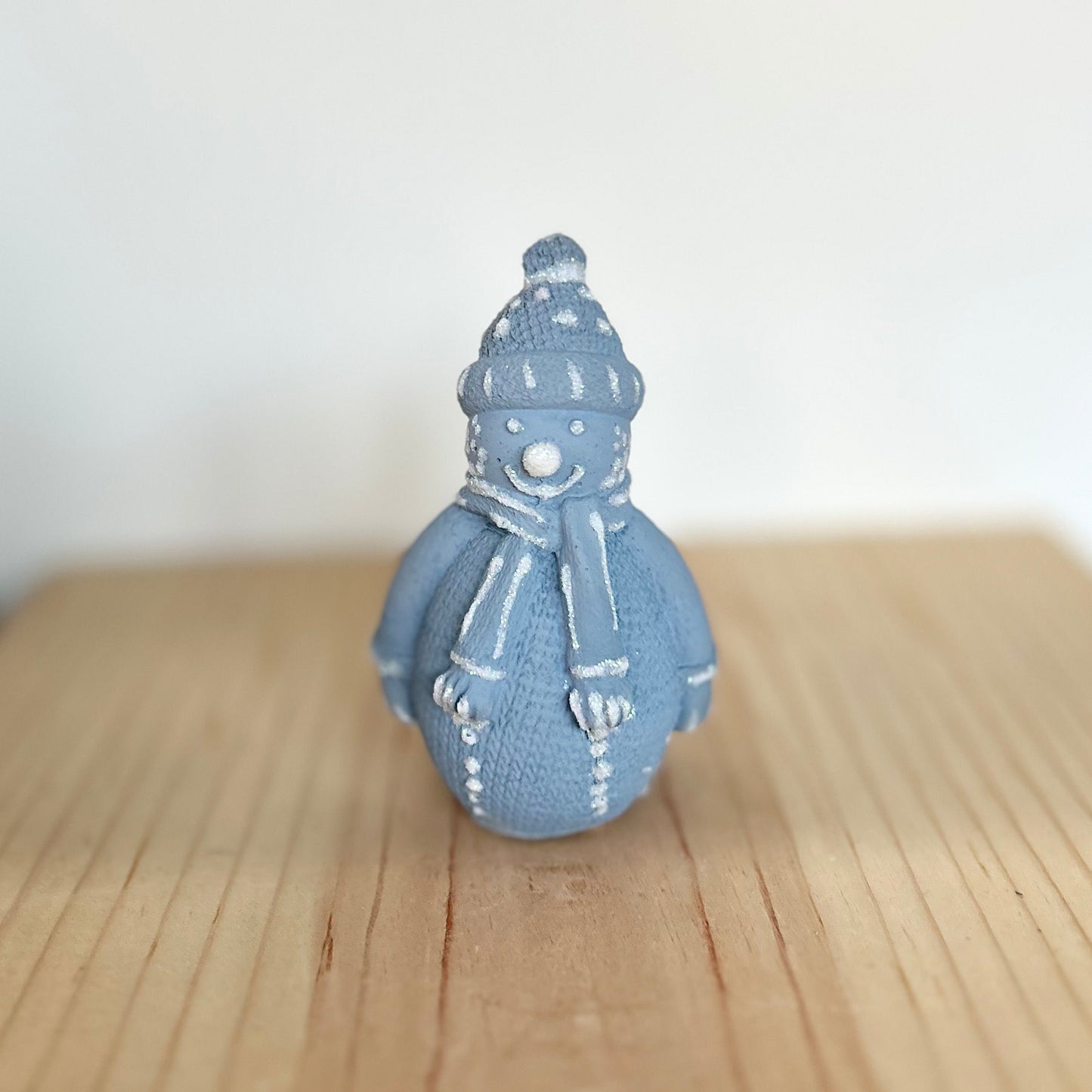 Cement Winter Snowman with snowflake scarf, in ice blue. Love Nene concrete snowman decor.