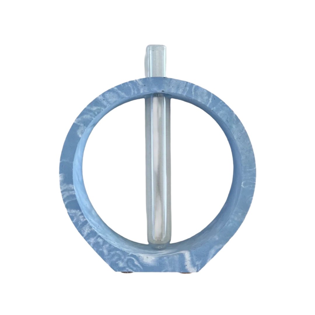 Round cement propagation station in marbled ice Blue.