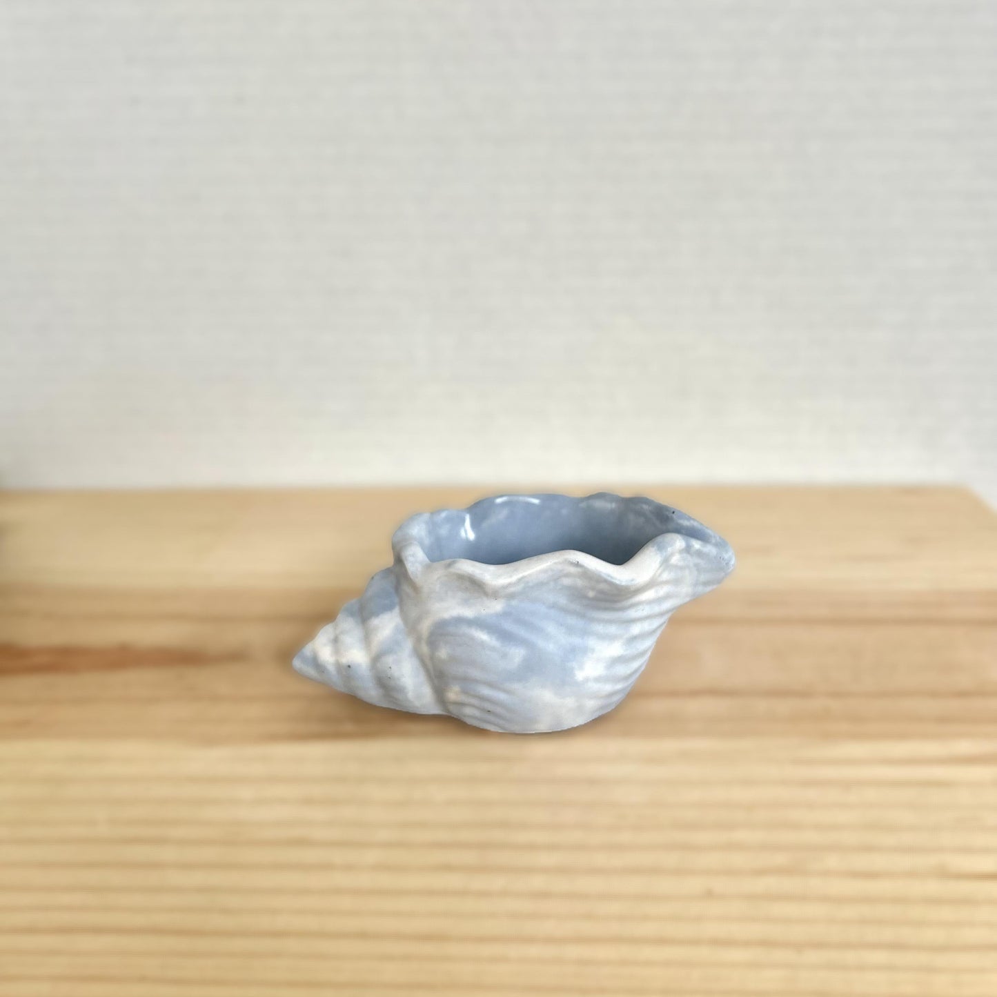 Concrete shell vessel in marbled ice blue. Love Nene shell vessels.