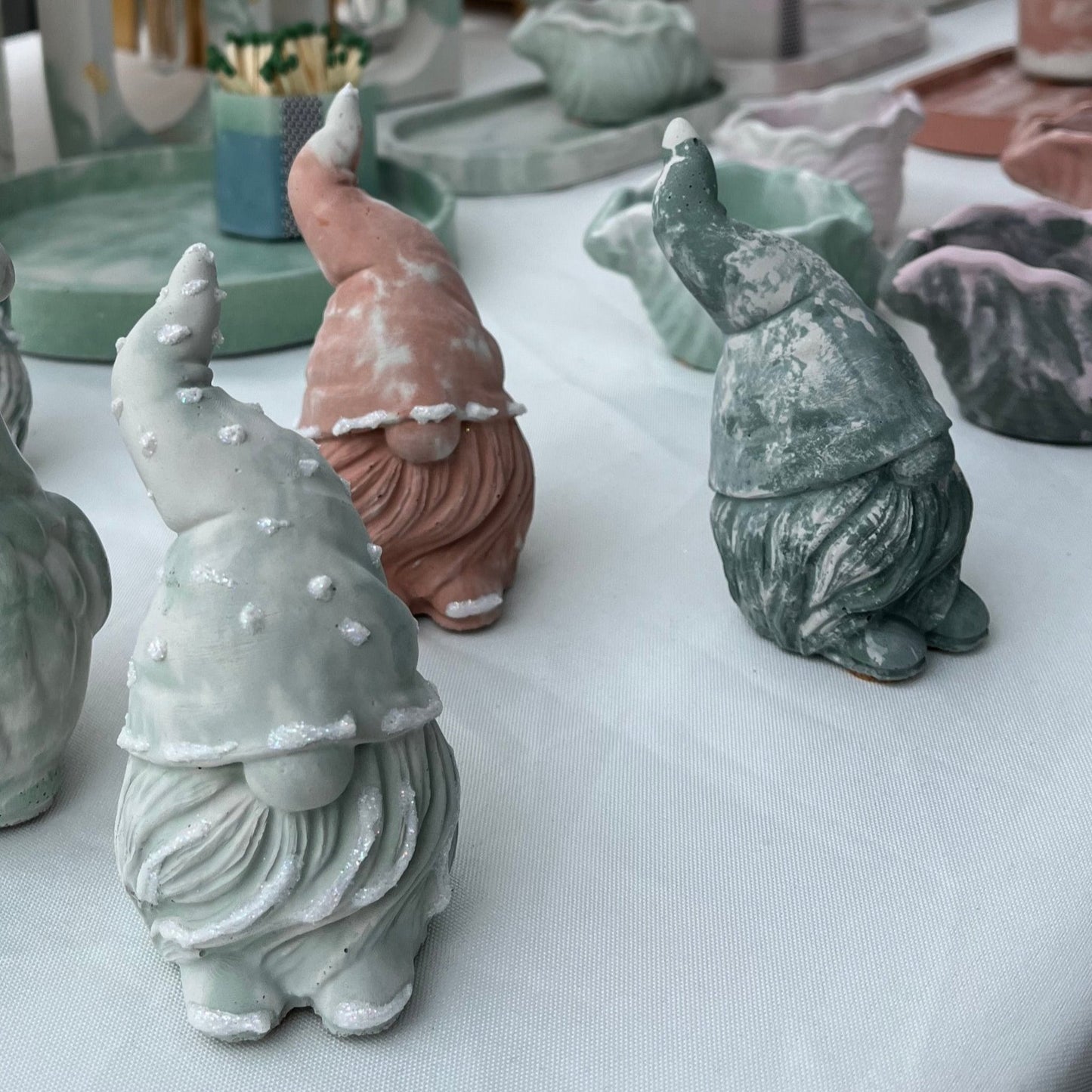 Cement Gnome Figurines in different color options. Shop Love Nene's adorable small concrete gnome figurines!