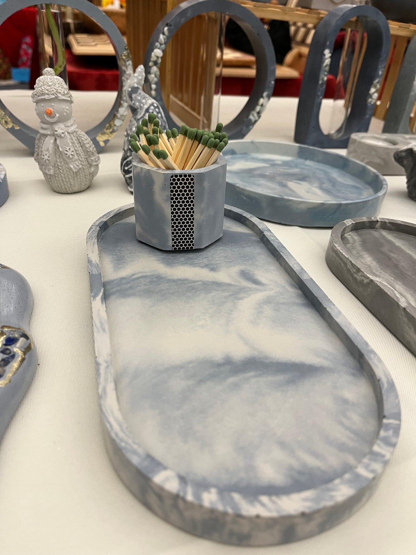 Cement octagon match holder in marbled ice blue
