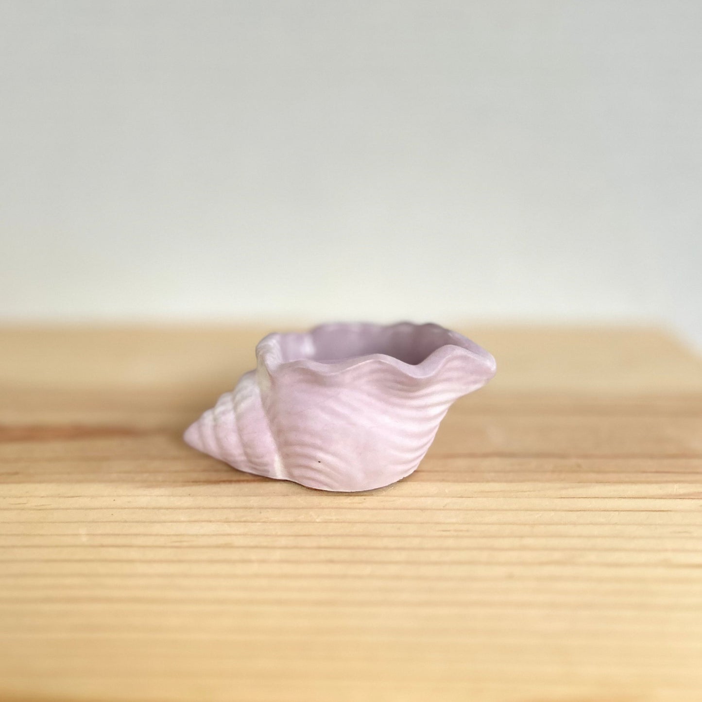 Concrete shell vessel in marbled pink Love Nene shell vessels. 