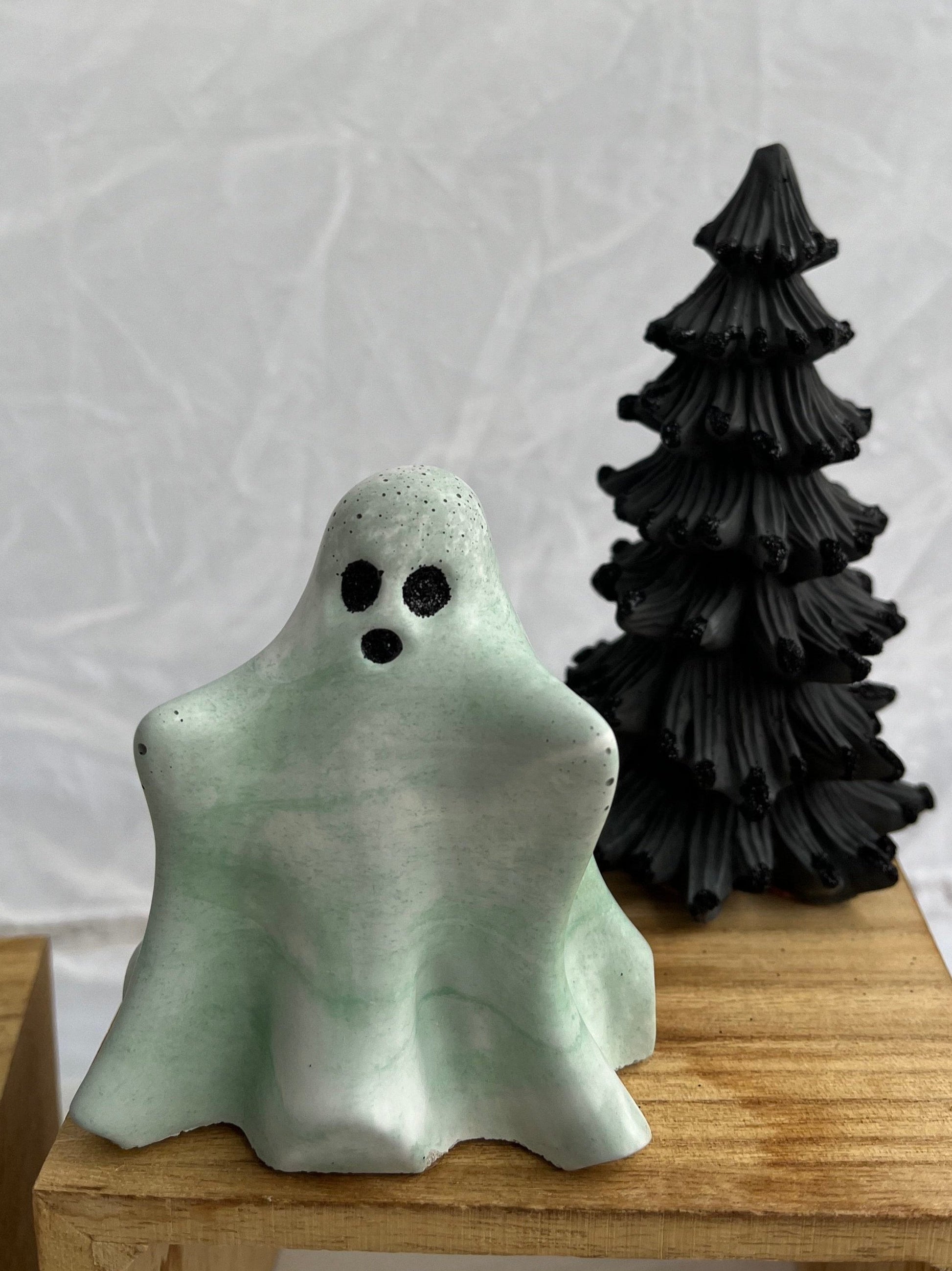 Halloween Ghost green and white marbled with Black Eyes. Love Nene Halloween Tablescape decor.