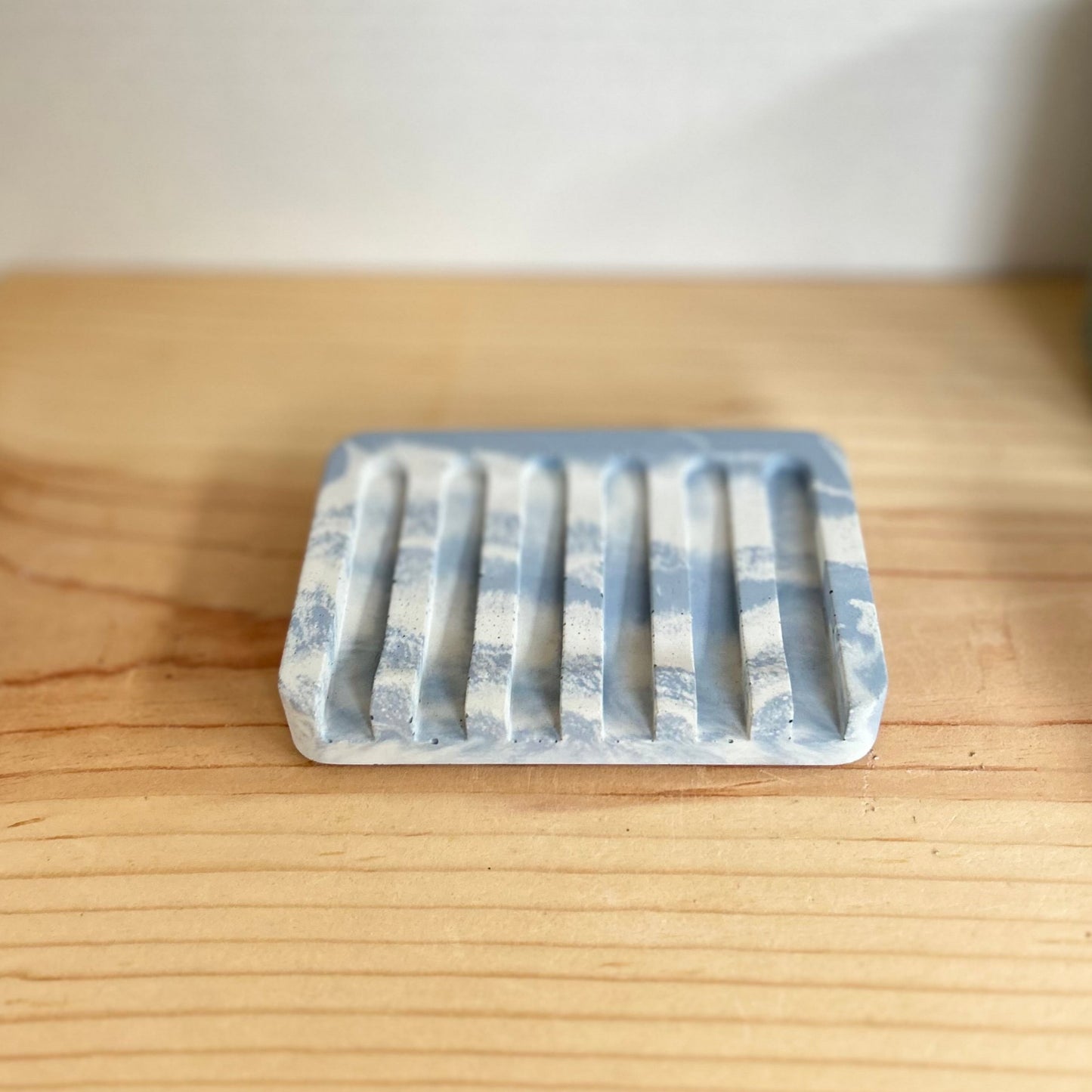 Concrete Soap Dish with Angled Drainage in marbled ice blue. Sponge holders and soap dishes by Love Nene. 