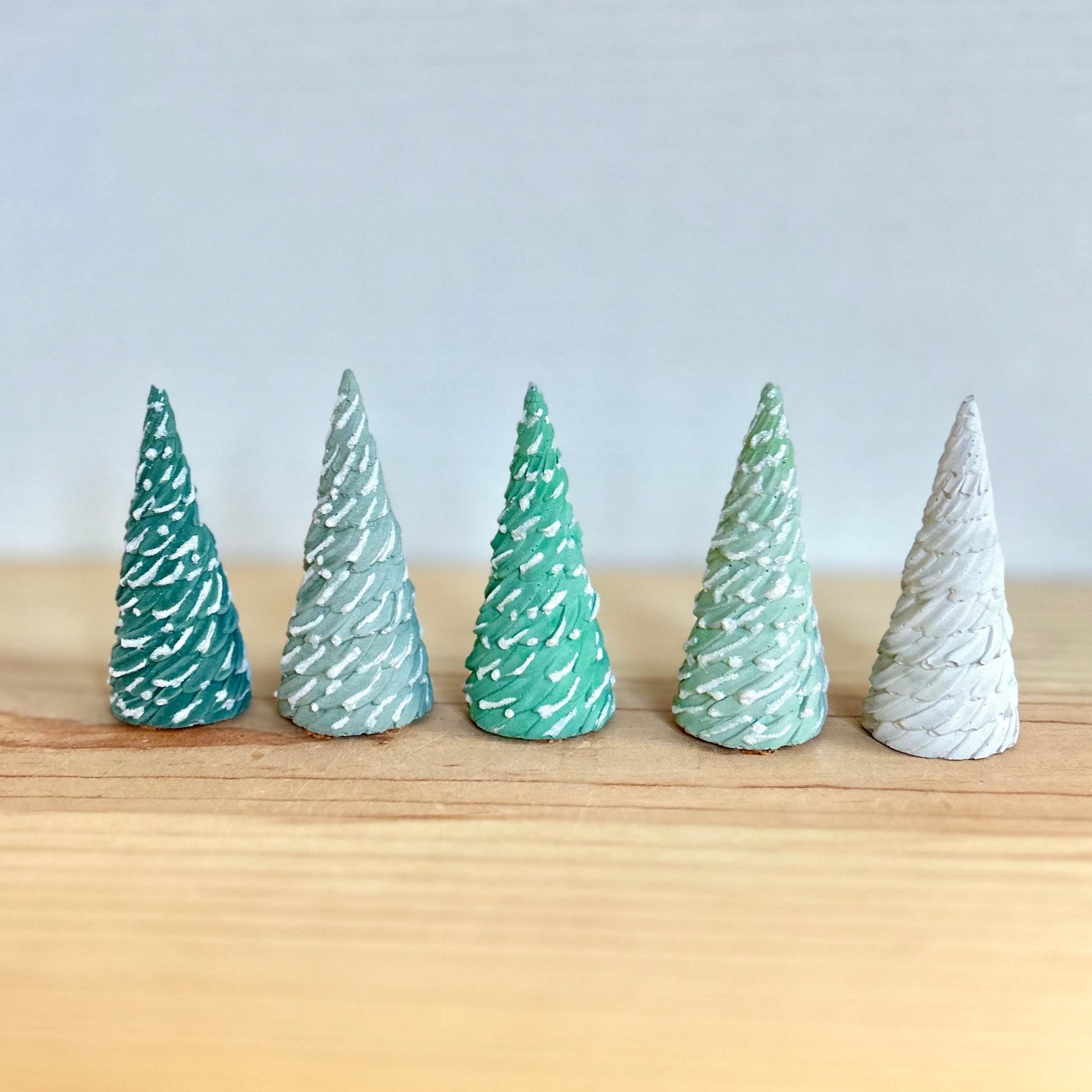 Scotch Pine Cement Trees in all green colors and cream. Shop Love Nene Concrete Christmas Tree decor. 