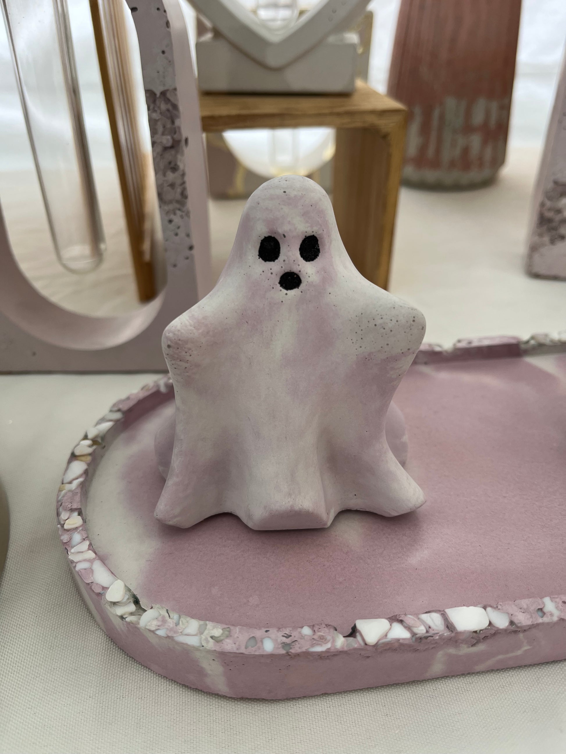 Halloween Ghost Figurine in pink and white marbled on white tray with shell details. Love Nene Ghost Figurines and Home Decor.