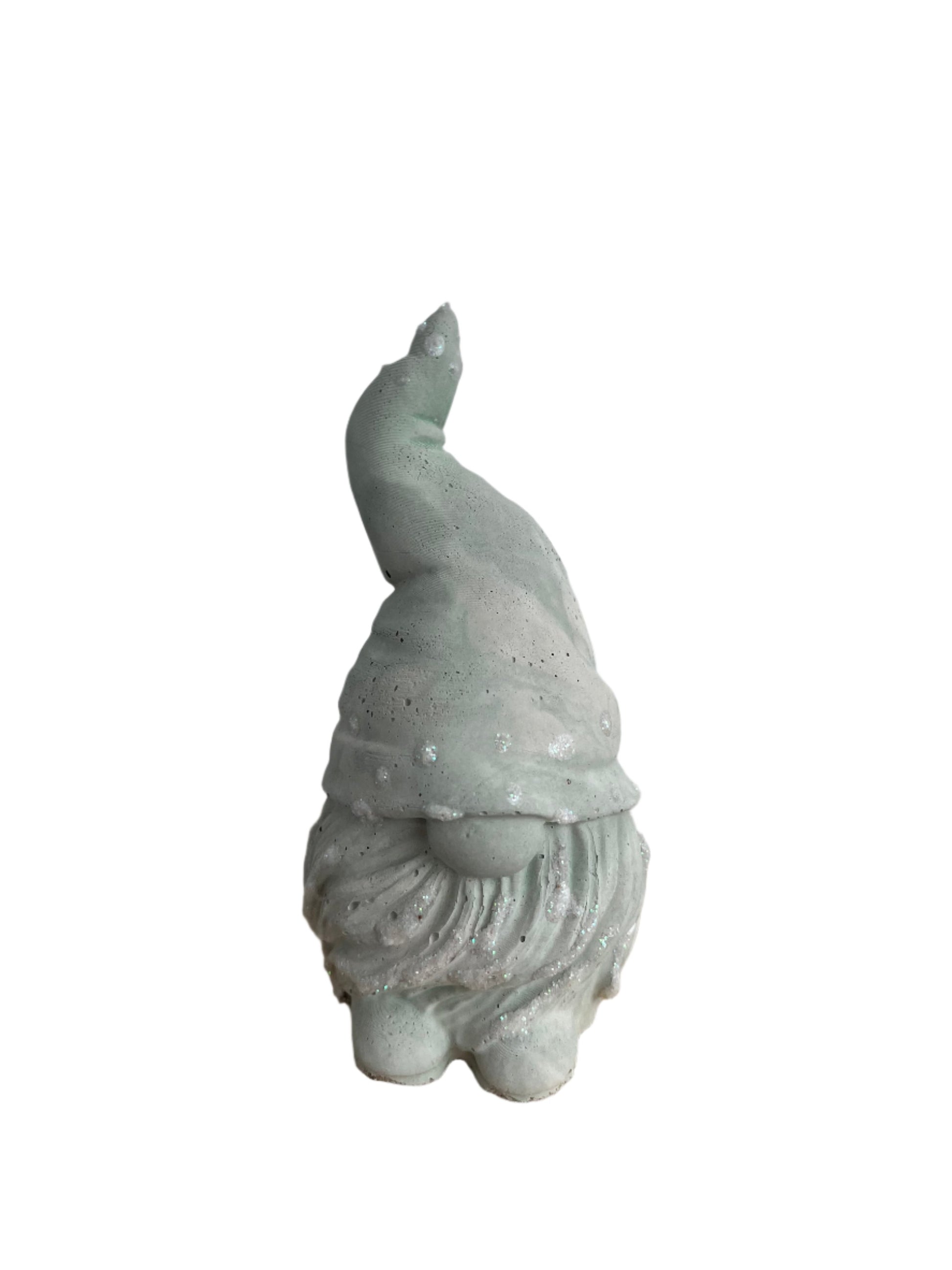 Cement Gnome Figurine in light green and cream marbled with glitter details.