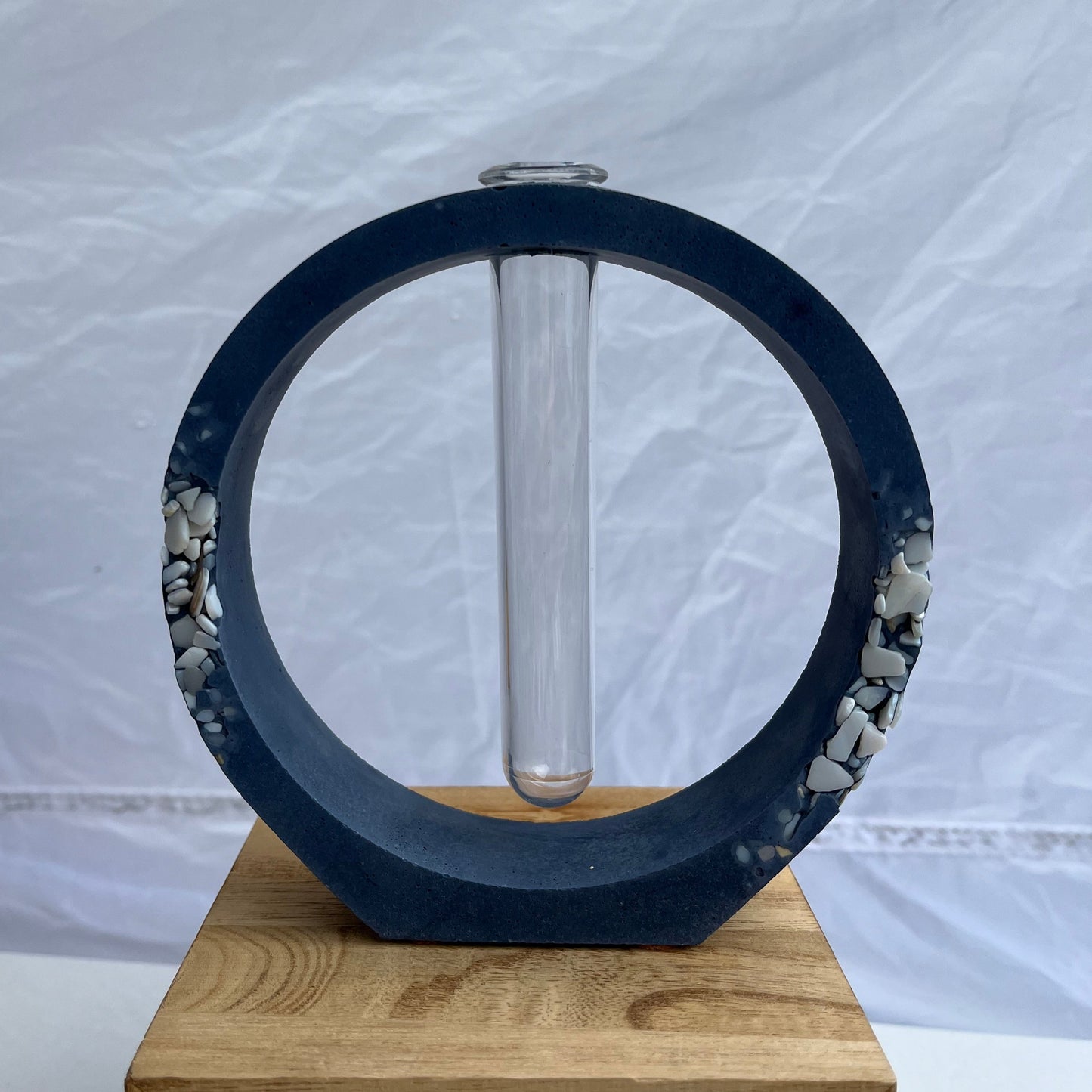 Round Propagation Station with Shell Details in Dark Blue.  