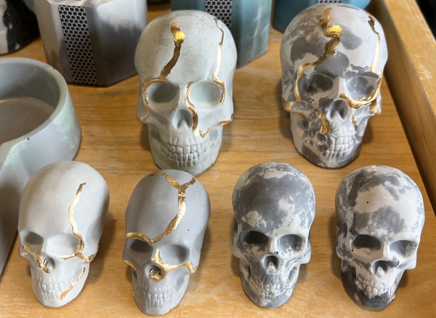 Halloween Concrete Skulls marbled and gold options. 
