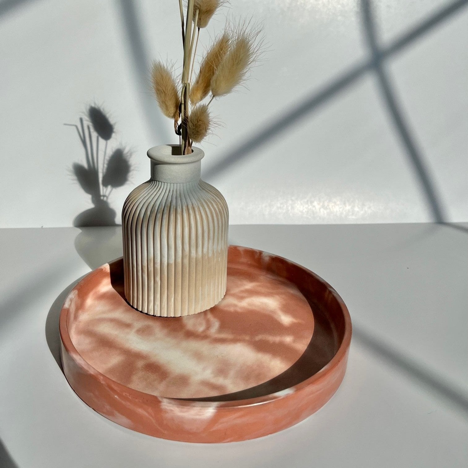 Cement Round Tray in marbled dusty terracotta. Concrete trays by Love Nene.